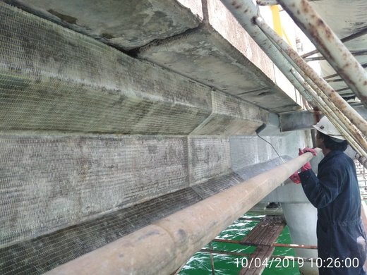 Perkuatan Struktur GFRP (E-glass) — dokumentasi aplikasi di lapangan (slide p-08)